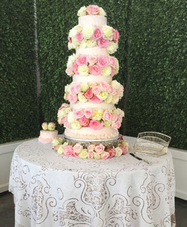 Rosey Waterfall Wedding Cake Flowers in Batesville, AR | Signature Baskets Flowers & Gifts